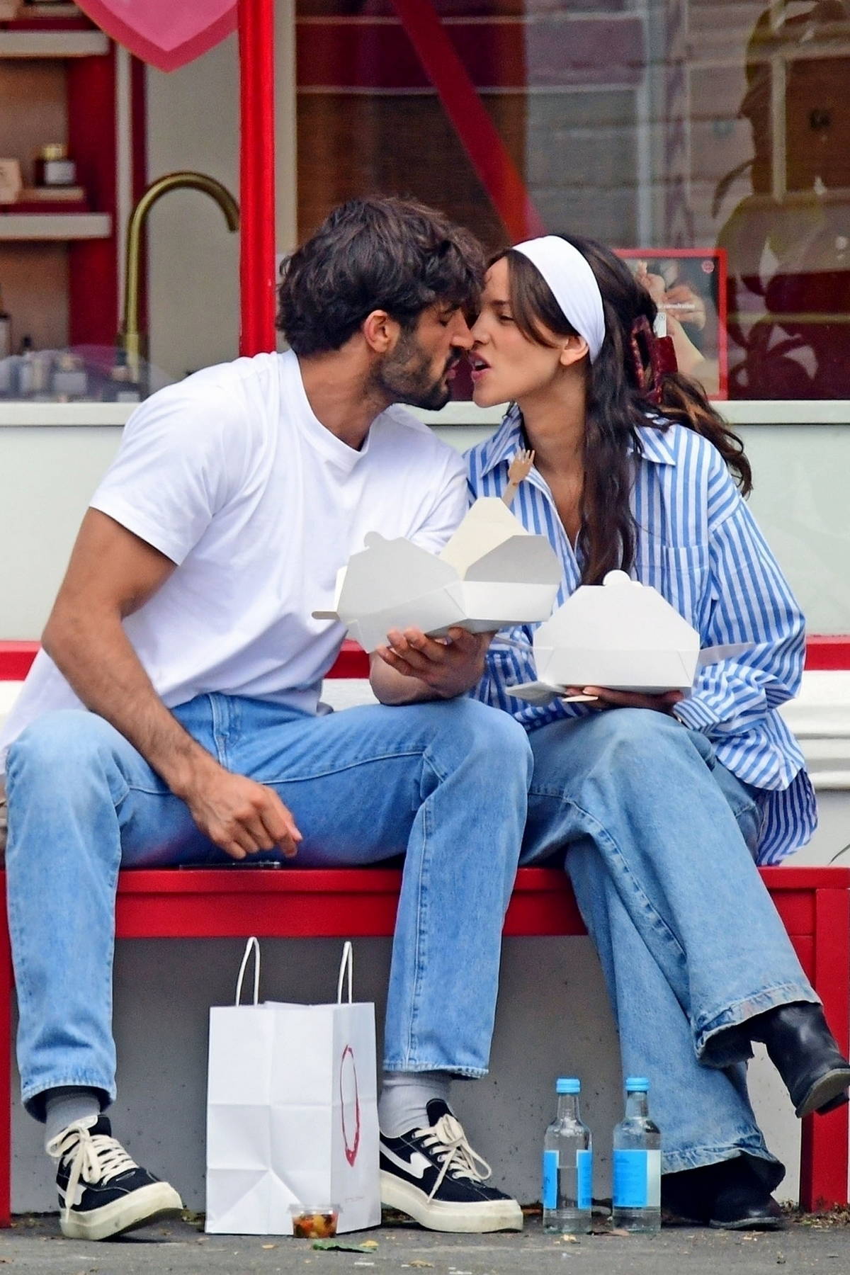 Eiza Gonzalez packs on some serious PDA with boyfriend Guy Binns while enjoying a lunch date in London, England