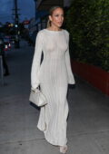 Jennifer Lopez wears her wedding ring and white see-through dress while stepping out for dinner amid divorce rumors in Santa Monica, California