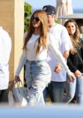Khloe Kardashian seems in happy spirits as she leaves a rare lunch date with Tristan Thompson at Nobu in Malibu, California