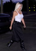 Kim Kardashian rocks tank top and cropped baggy pants while attending a late meeting in Los Angeles