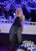 Camila Cabello rocks a corset top and jeans while celebrating 'C,XOXO' launch party at The Box in Soho in London, England
