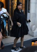 Cardi B dons a black dress while seen heading out to dinner in Paris, France