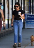 Lucy Hale looks stylish in a black top and blue jeans while spotted catching up with a friend over coffee in Studio City, California