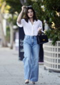 Lucy Hale looks stylish in a white shirt and blue jeans while out on a dinner date with David Bernard at Uchi in Los Angeles