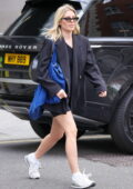 Mollie King makes a leggy appearance spandex shorts and blazer stepping out from her New Show at BBC Radio One in London, England