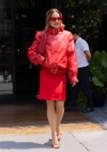 Rita Ora rocks an all red leather jacket with matching skirt and heels while heading out of her hotel in New York City