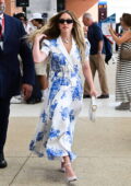 Sydney Sweeney looks stunning in a white and blue floral print dress as she arrives at Marco Polo airport for the 81st Venice Film Festival in Venice, Italy