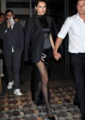 Adriana Lima is elegant in all-black ensemble as she leaves dinner at Costes in Paris, France