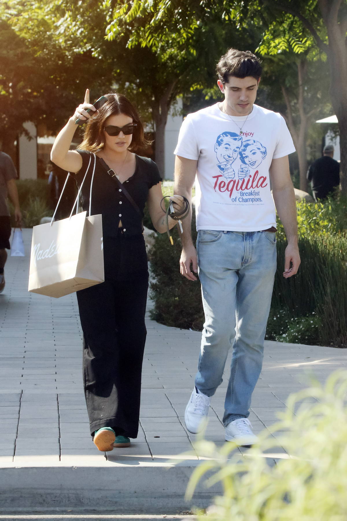 Lucy Hale dons all black attire while stepping out for some shopping with a friend in Los Angeles