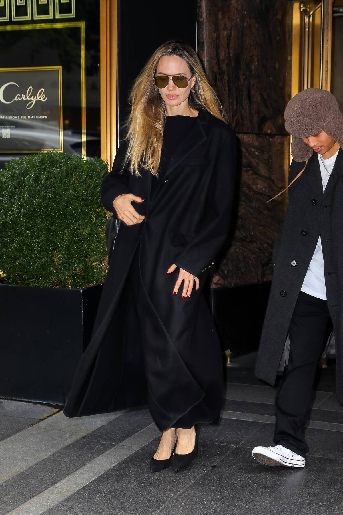 Angelina Jolie looks elegant as ever as she leaves The Carlyle hotel with her son, Pax in New York City