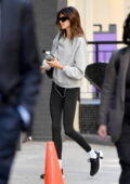 Kaia Gerber displays her mile-long legs in black leggings while stepping out in New York City