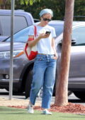 Olivia Wilde dressed casual in a white tee and jeans while spotted at her daughter's basketball game in Los Angeles