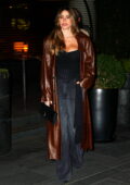 Sofia Vergara looks stylish in a brown leather coat with a black corset and Bottega Veneta bag during outing in New York City