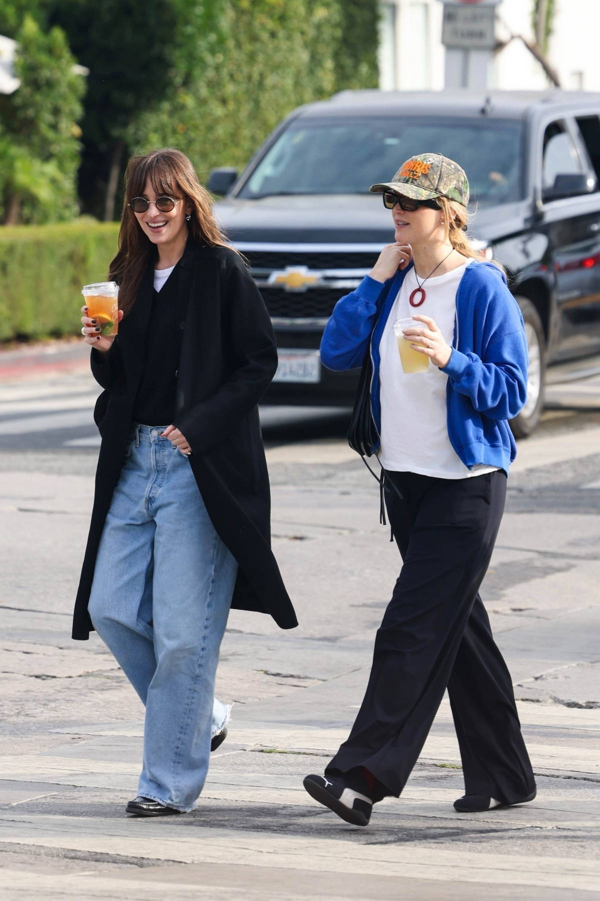 Jennifer Lawrence and Dakota Johnson step out together for some shopping in Los Angeles