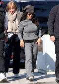 Salma Hayek flanked by her entourage as she arrives at Athens Airport in Greece