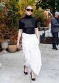 Saoirse Ronan looks amazing in a black top and white skirt while stepping out on the Lower East Side in New York City