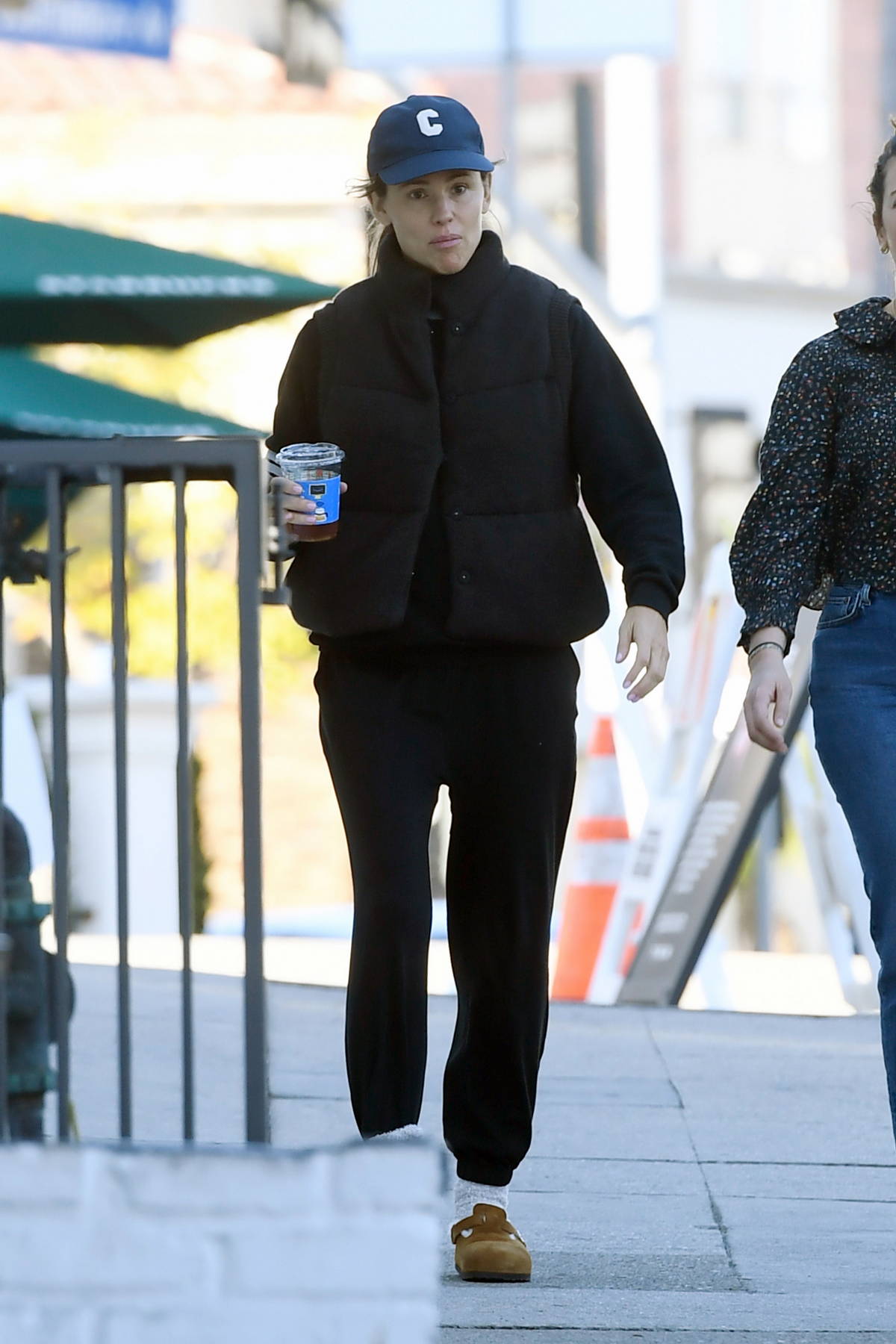 Jennifer Garner dons a puffer jacket and sweatpants while stepping out for coffee with a friend in Los Angeles